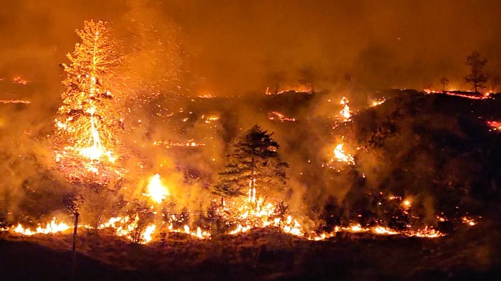 A view shows wildfires in West Kelowna, British Columbia, Canada, Aug. 17, 2023, in this screen grab obtained from a social media video.