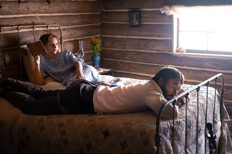 Felicity Jones as Gladys Grainier and Joel Edgerton as Robert Grainier.