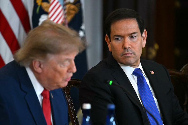 US Secretary of State Marco Rubio (R) listens as US President Donald Trump speaks during a roundtable on the American mining industry at the US Department of State in Washington, DC, on August 7, 2026. (Photo by Kent NISHIMURA / AFP via Getty Images)