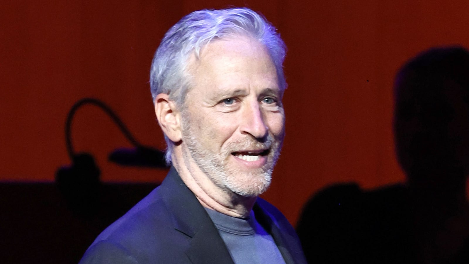 NEW YORK, NEW YORK - NOVEMBER 06: Jon Stewart performs onstage during the 17th Annual Stand Up For Heroes Benefit presented by Bob Woodruff Foundation and NY Comedy Festival at David Geffen Hall on November 06, 2023 in New York City. (Photo by Jamie McCarthy/Getty Images for Bob Woodruff Foundation)