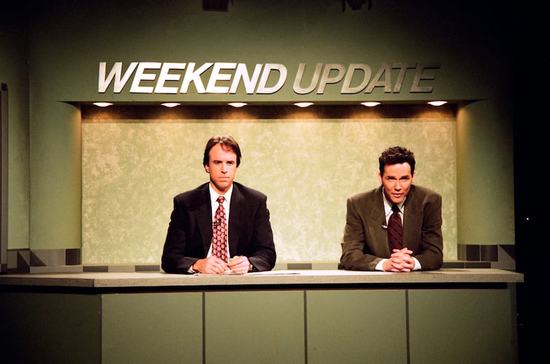 Kevin Nealon, Norm MacDonald during the 'Weekend Update' skit on May 14, 1994