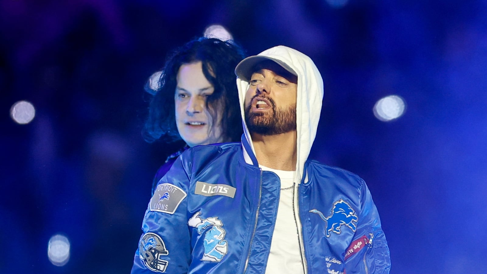 Eminem and Jack White perform during halftime of a Thanksgiving NFL football game between the Detroit Lions and the Green Bay Packers at Ford Field