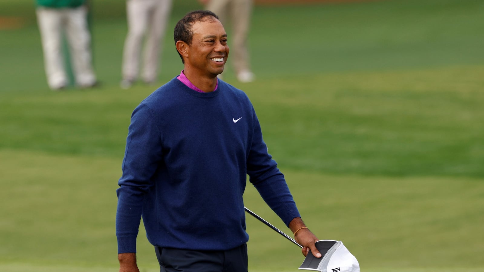 2021-02-24T231539Z_1876832695_RC2BZL98VXGS_RTRMADP_3_PEOPLE-WOODS-GOLF_zmebac