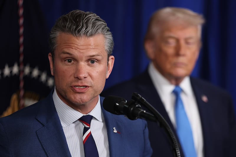 PALM BEACH, FLORIDA - JANUARY 03: U.S. Secretary of War Pete Hegseth speaks during a press conference with U.S. President Donald Trump at Mar-a-Lago club on January 03, 2026, in Palm Beach, Florida. During the event, President Trump confirmed that the U.S. military carried out a large-scale strike in Caracas overnight, resulting in the capture of Venezuelan leader Nicolas Maduro and his wife, Cilia Flores.  (Photo by Joe Raedle/Getty Images)