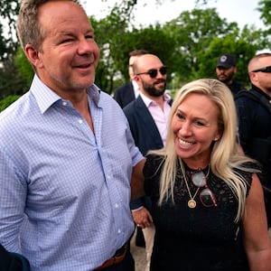 WASHINGTON, DC - MAY 8: Rep. Marjorie Taylor Greene (R-GA), and her boyfriend Brian Glenn a host at the conservative Right Side Broadcasting Network, walk together after she and Rep.
