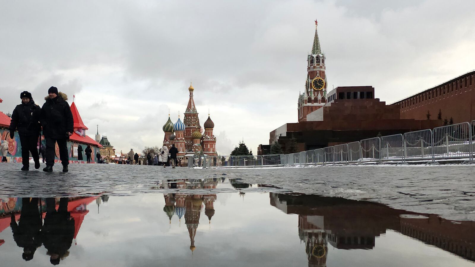 Russian police officers walk along the Red Square near the Kremlin, February 5, 2024 in Moscow, Russia.
