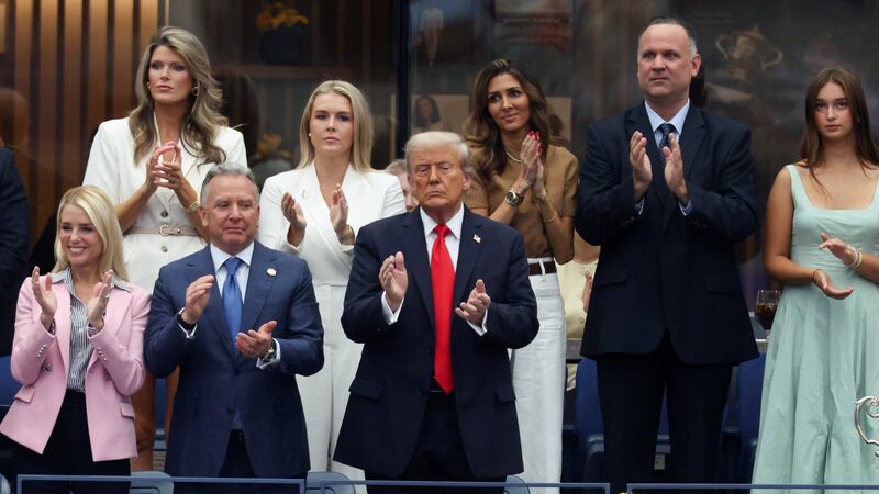 U.S. President Donald Trump, U.S. White House Special Envoy Steve Witkoff, U.S. Attorney General Pam Bondi and U.S. White House Press Secretary Karoline Leavitt clap during the U.S. Open men's tennis final at Arthur Ashe Stadium, in Flushing Meadows, New York City, U.S., September 7, 2025.