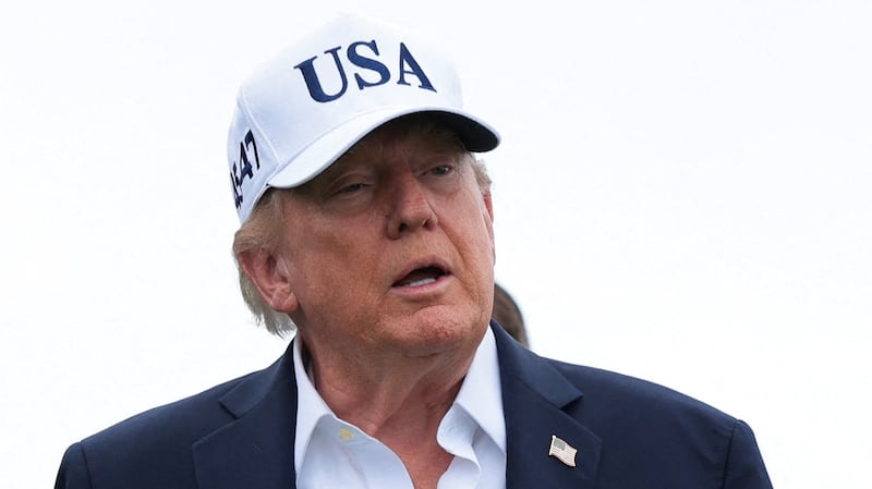 U.S. President Donald Trump attends the Amgen Irish Open at Trump International Golf Links in Doonbeg, Ireland, September 13, 2026. REUTERS/Kylie Cooper