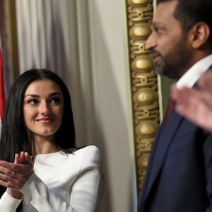 Kash Patel is applauded by his partner Alekins Wilkins after being sworn in as FBI director by U.S. Attorney General Pam Bondi in the Indian Treaty Room in the Eisenhower Executive Office Building (EEOB) on the White House campus in Washington, D.C., U.S., February 21, 2025. REUTERS/Leah Millis