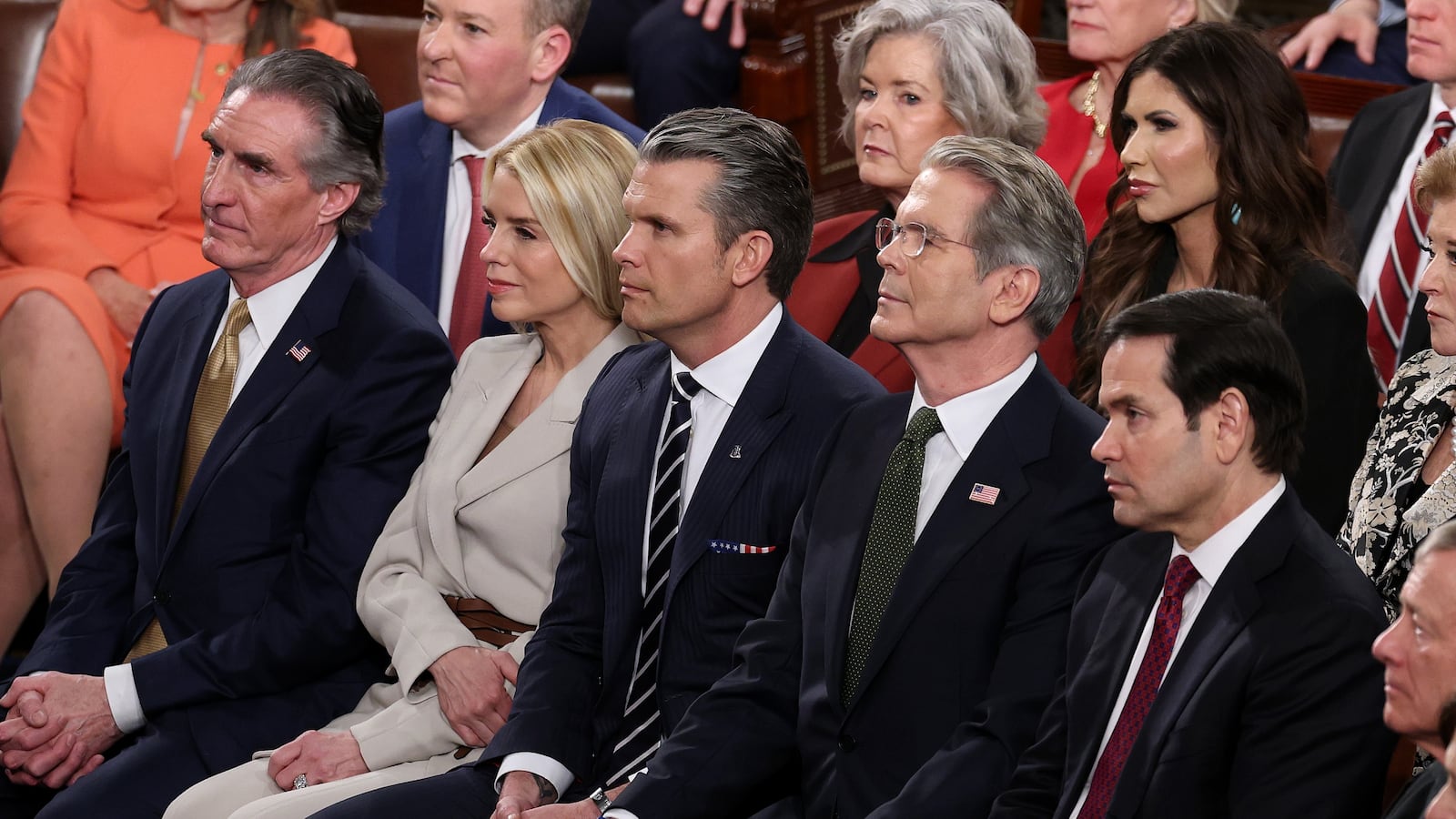 WASHINGTON, DC - FEBRUARY 24: Cabinet members (L to R) Secretary of the Interior Doug Burgum, Attorney General Pam Bondi, Secretary of War Pete Hegseth, Treasury Secretary Scott Bessent and Secretary of State Marco Rubio watch President Donald Trump's State of the Union address during a Joint Session of Congress at the U.S. Capitol on February 24, 2026, in Washington, DC. Trump delivered his address days after the Supreme Court struck down the administration's tariff strategy and amid a U.S. military buildup in the Persian Gulf threatening Iran. (Photo by Win McNamee/Getty Images)