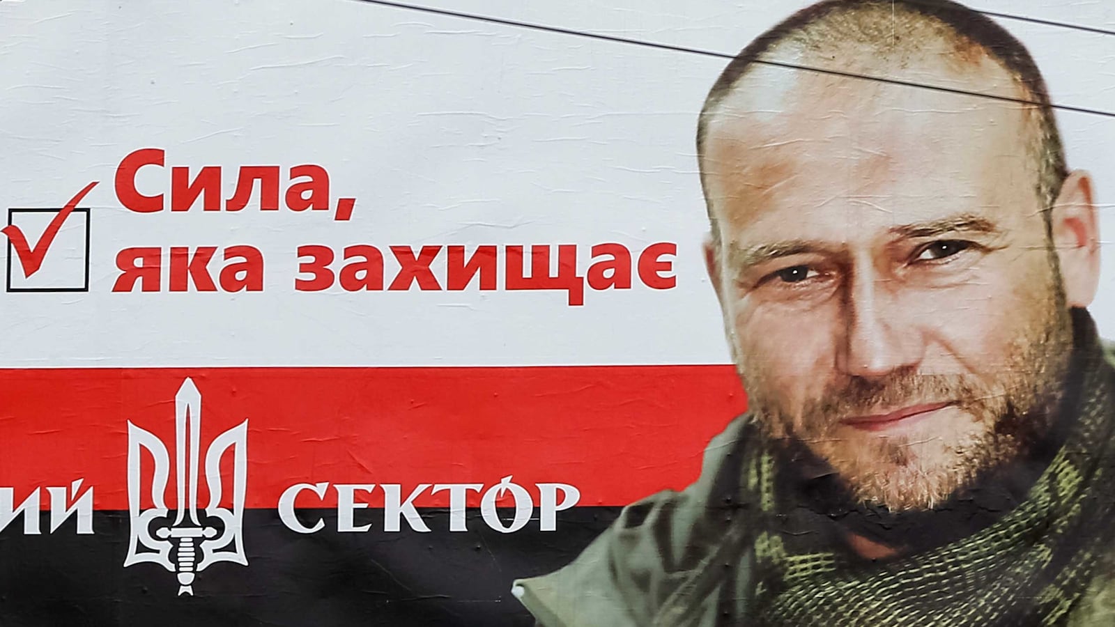 articles/2015/05/05/as-ukraine-murders-multiply-who-s-the-lead-suspect/150404-georgian-right-wing-ukraine-yarosh-tease_lobakk