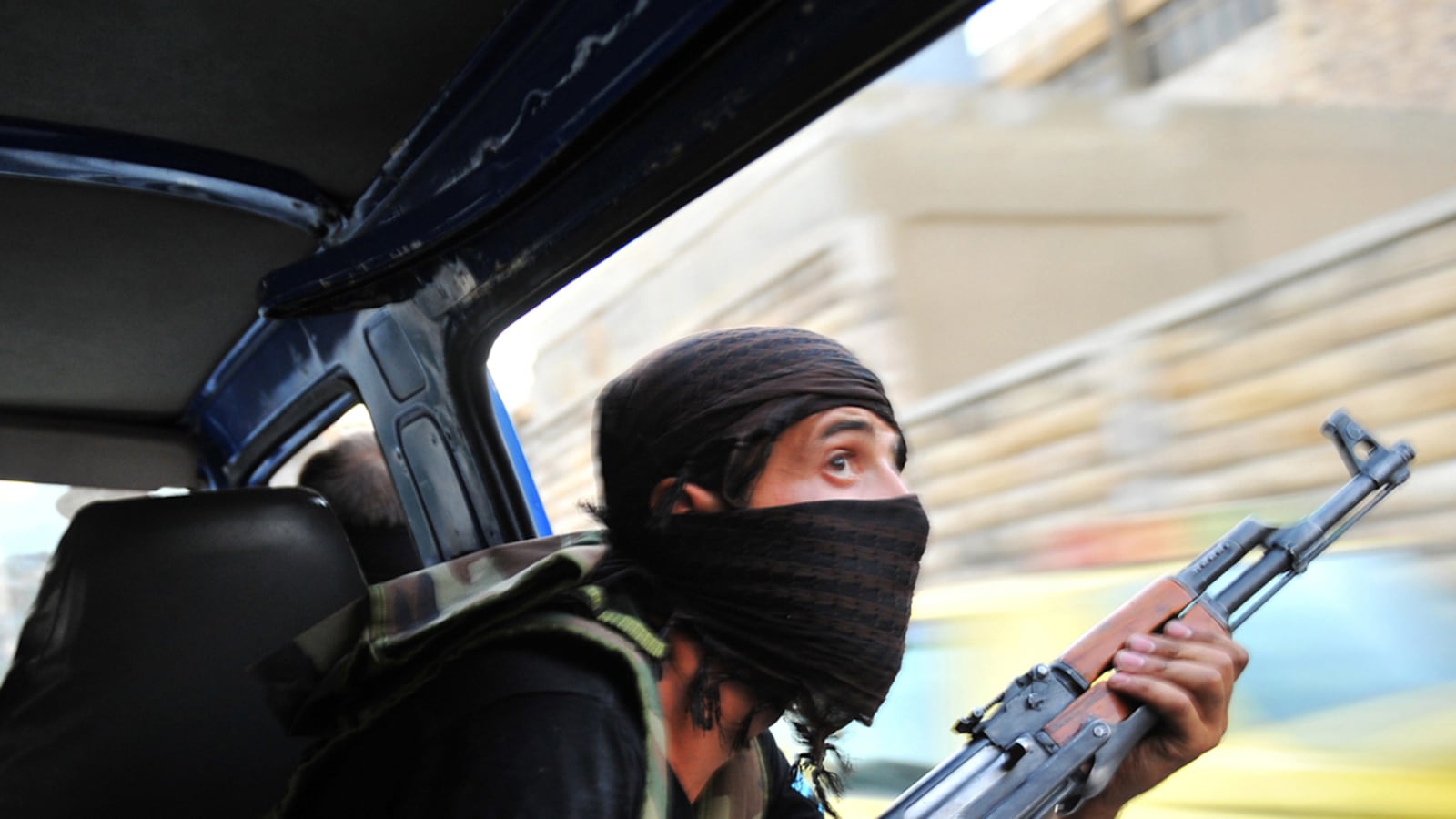 articles/2012/07/24/syria-s-rag-tag-rebel-army-s-sophisticated-campaigns/giglio-fsa-rebels-syria-topbox_xgaqjv