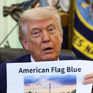 WASHINGTON, DC - JUNE 03: U.S. President Donald Trump displays a rendering of his proposed renovations to the Lincoln Memorial Reflecting Pool during an event in the Oval Office of the White House on June 03, 2026 in Washington, DC. The landmark is being painted as part of President Trump's efforts to repair Washington D.C. in preparation for the Nation's 250th birthday. (Photo by Kevin Dietsch/Getty Images)