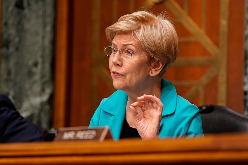 Senate Banking Committee ranking member Senator Elizabeth Warren repeatedly grilled Trump's Federal Reserve chair nominee Kevin Warsh about his financial investments at his confirmation hearing and slammed his refusals to respond directly.