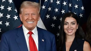 A photo of Julia Varvaro posing with Donald Trump.