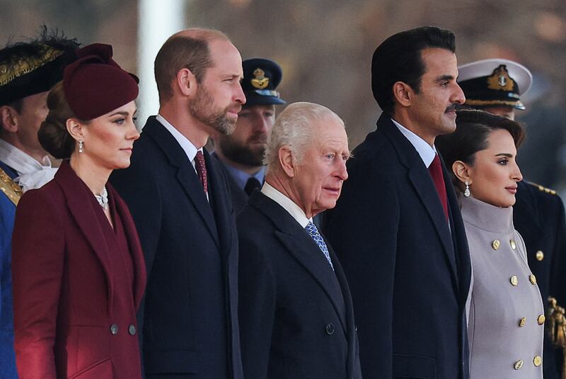 Britain's King Charles, William, Prince of Wales and Catherine, Princess of Wales stand with Qatari Emir Sheikh Tamim bin Hamad al-Thani and his wife Sheikha Jawaher bint Hamad bin Suhaim Al-Thani, during a ceremonial welcome for the Qatari Emir and his wife, at the Horse Guards Parade.