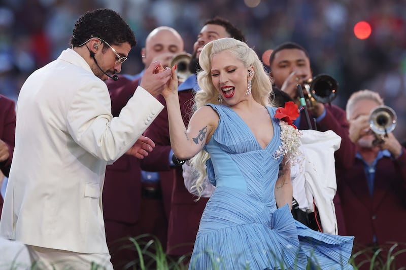 Bad Bunny and Lady Gaga perform onstage during the Apple Music Super Bowl LX Halftime Show