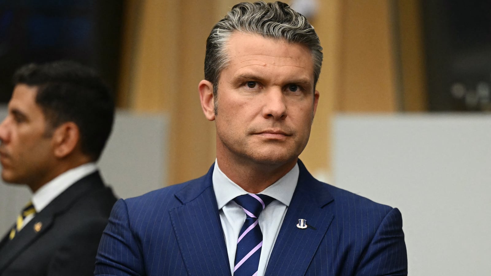US Defense Secretary Pete Hegseth looks on ahead of the meeting of the Ukraine Defence Contact Group, part of the meeting of NATO Ministers of Defence Summit at the NATO headquarters in Brussels on October 15, 2025.