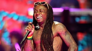 articles/2013/03/18/rapper-lil-wayne-and-his-struggle-with-sizzurp-drank/130317-lil-wayne-samuels-tease_ihwerv