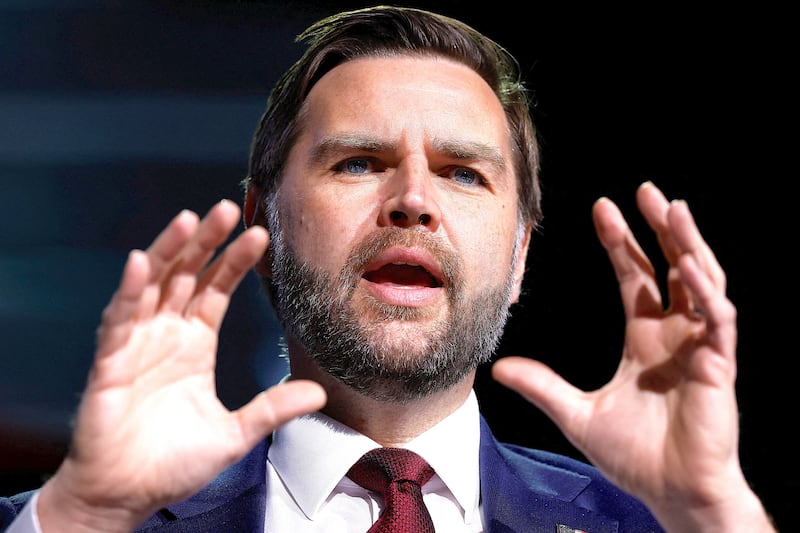 U.S. Vice President JD Vance participates in a "fireside chat" during a Turning Point USA event