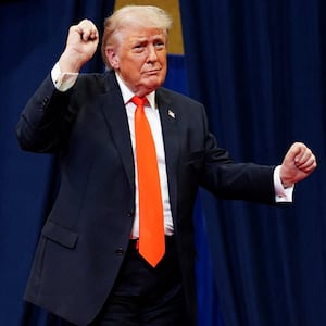 U.S. President Donald Trump dances as he departs an event at The Villages Charter School at The Villages, Florida, U.S., May 1, 2026. REUTERS/Nathan Howard