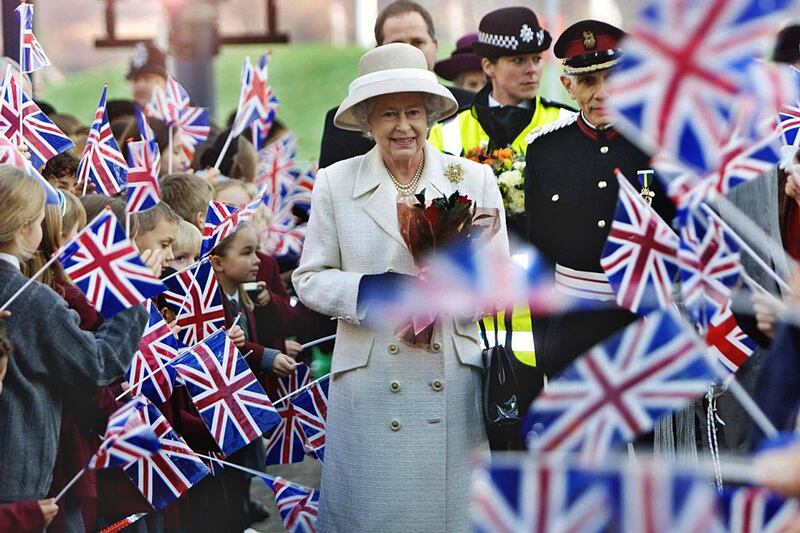 articles/2013/05/31/queen-visits-london-terror-attack-site/queen-woolwich_mkr6tk