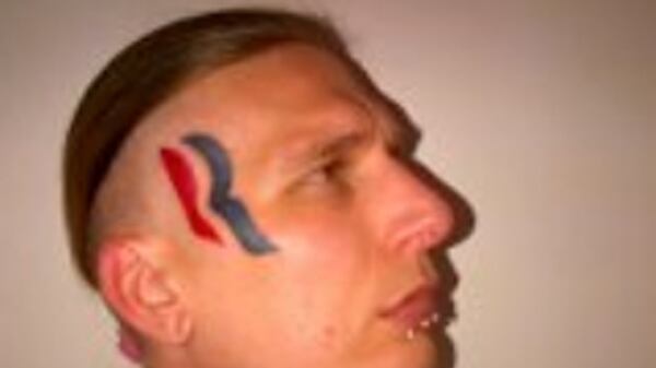 cheats/2012/11/12/guy-with-mitt-face-tattoo-disappointed/romney-face-tattoo-eric-hartsburg-cheat_g57xjl