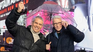 NEW YORK, NEW YORK - DECEMBER 31: Andy Cohen and Anderson Cooper host CNN's New Year's Eve coverage in the rain in Times Square on December 31, 2024 in New York City. (Photo by Craig T Fruchtman/WireImage)