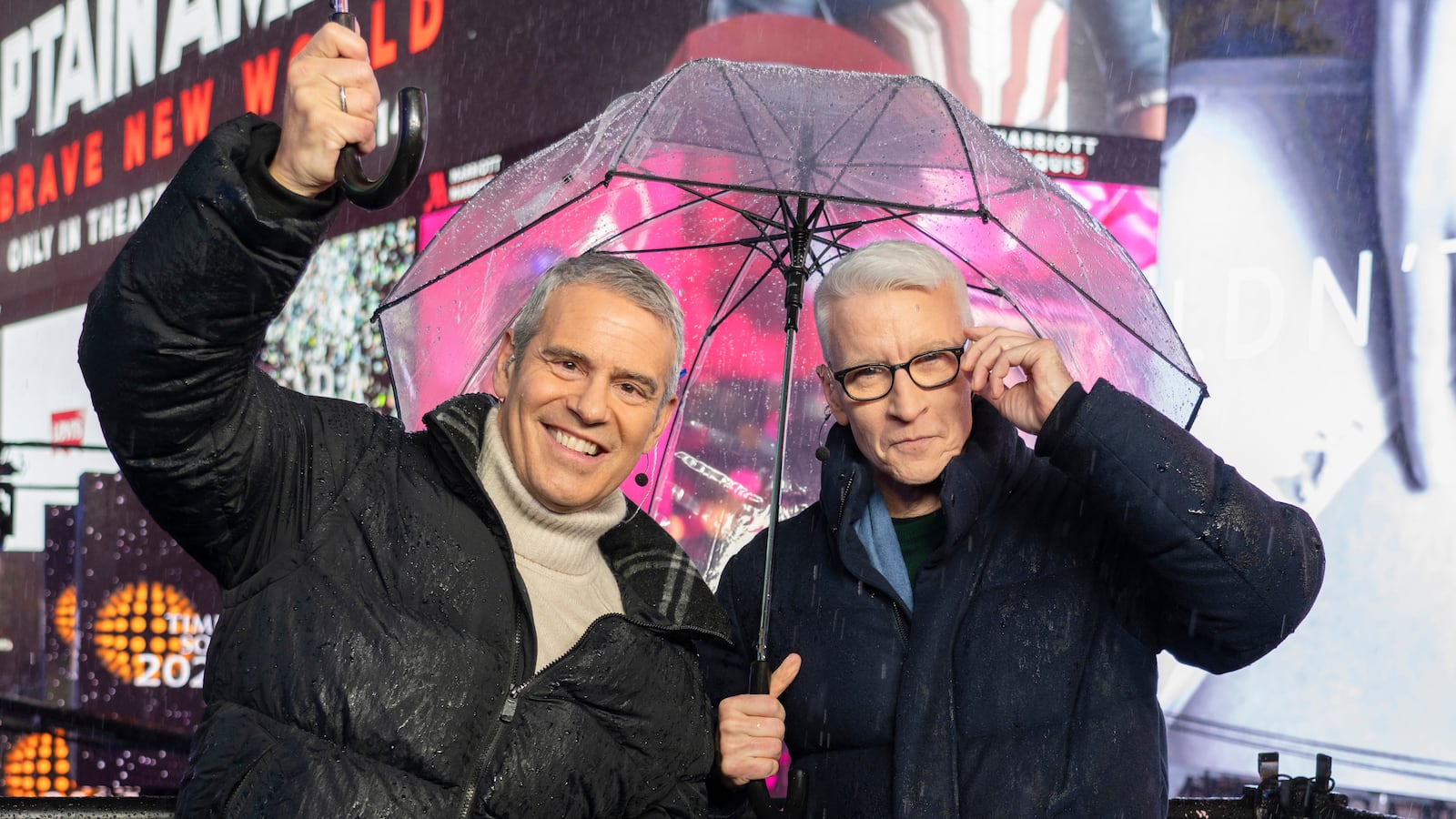 NEW YORK, NEW YORK - DECEMBER 31: Andy Cohen and Anderson Cooper host CNN's New Year's Eve coverage in the rain in Times Square on December 31, 2024 in New York City. (Photo by Craig T Fruchtman/WireImage)