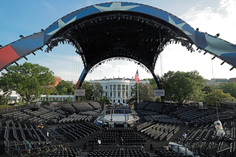Construction continues on the Ultimate Fighting Championship (UFC) "Claw" and the octagon fighting ring on the South Lawn of the White House.