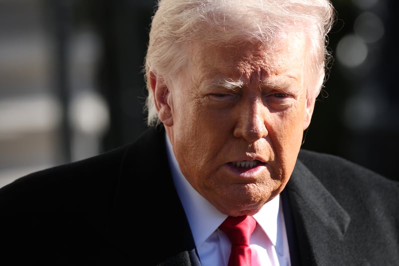 WASHINGTON, DC - JANUARY 13: U.S. President Donald Trump exits on to the South Lawn as he departs the White House January 13, 2026 in Washington, DC. Trump is scheduled to travel today to visit the Ford River Rouge complex and speak at the Detroit Economic Club. (Photo by Win McNamee/Getty Images)