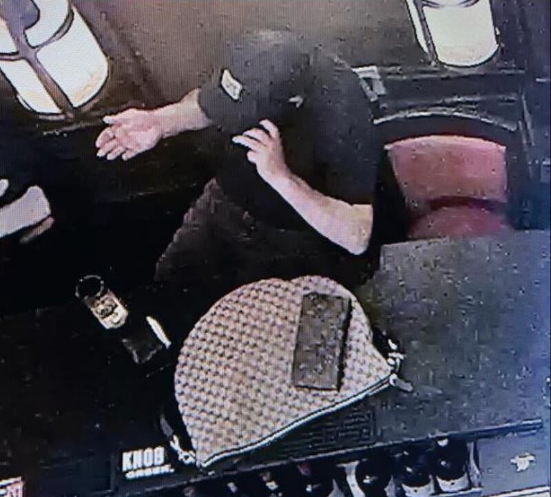 CCTV shows Mario Bustamante Leiva sitting next to Noem's Gucci bag.