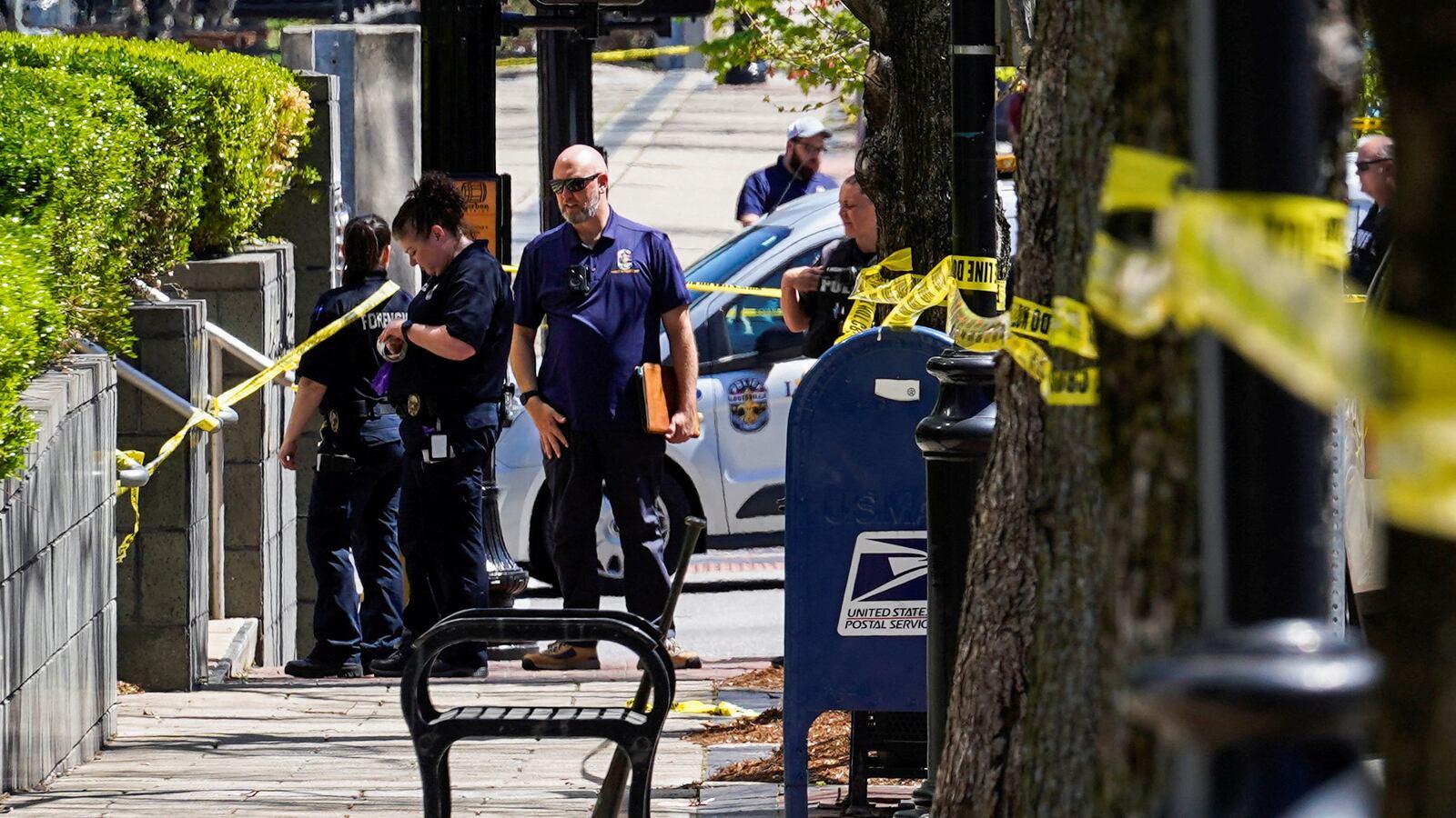 Police deploy at the scene of a mass shooting outside an Old National Bank branch near Slugger Field baseball stadium in downtown Louisville, Kentucky