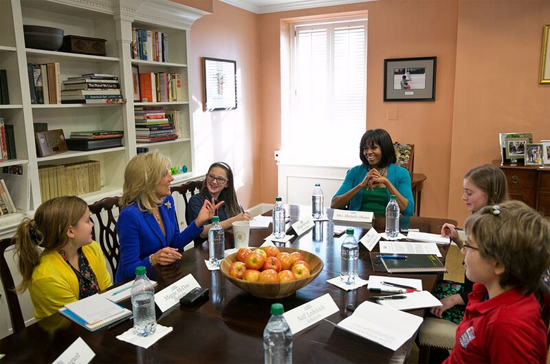 First Lady Michelle Obama and Dr. Jill Biden are interviewed by young reporters during a kids magazine roundtable in the First Lady’s Office in the East Wing of the White House, Jan. 18, 2013.