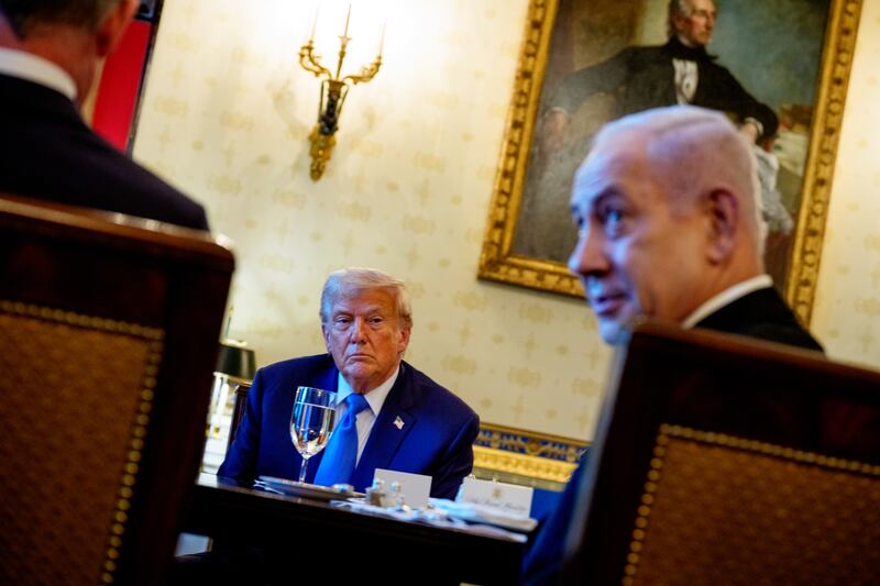 Benjamin Netanyahu, accompanied by U.S. President Donald Trump (L), speaks during a dinner in the Blue Room of the White House on July 07, 2025 in Washington, DC.