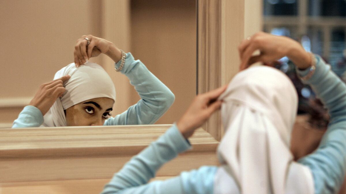 cheats/2011/10/04/woman-sues-over-headscarf-removal/headscarf-wiw-cheat_vfxfzk