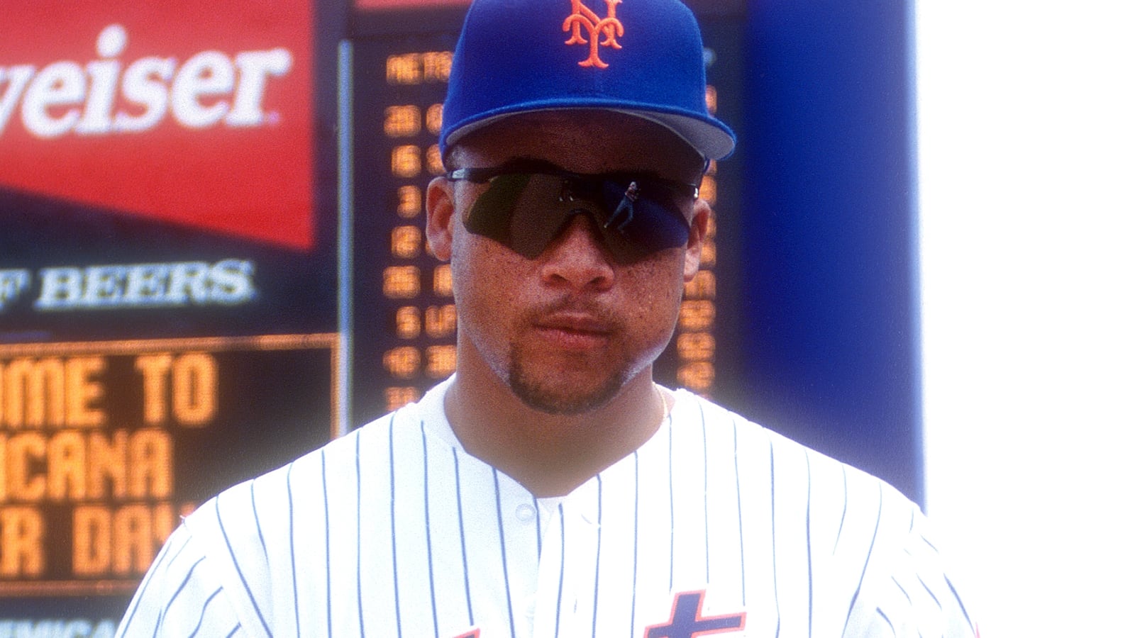 NEW YORK, NEW YORK - JUNE 18: Butch Huskey #25 of the New York Mets looks on before a baseball game against the Houston Astros on June 18, 1995 at Shea Stadium in New York City. (Photo by Mitchell Layton/Getty Images)