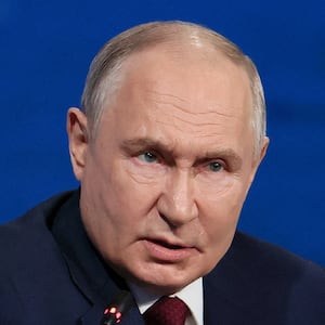 Russia's President Vladimir Putin attends a forum.