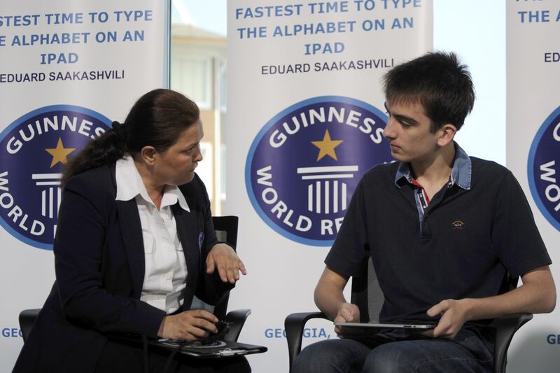 galleries/2011/11/30/world-records-broken-in-2011-photos/world-records-fastest-alphabet-typed-on-ipad_db0ac1