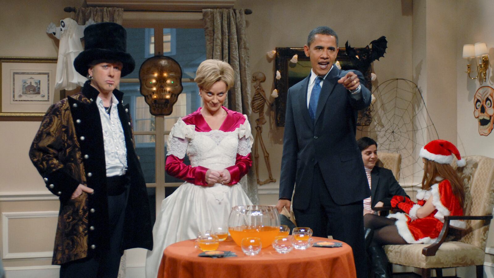 Darrell Hammond as Bill Clinton, Amy Poehler as Hillary Clinton, Barack Obama