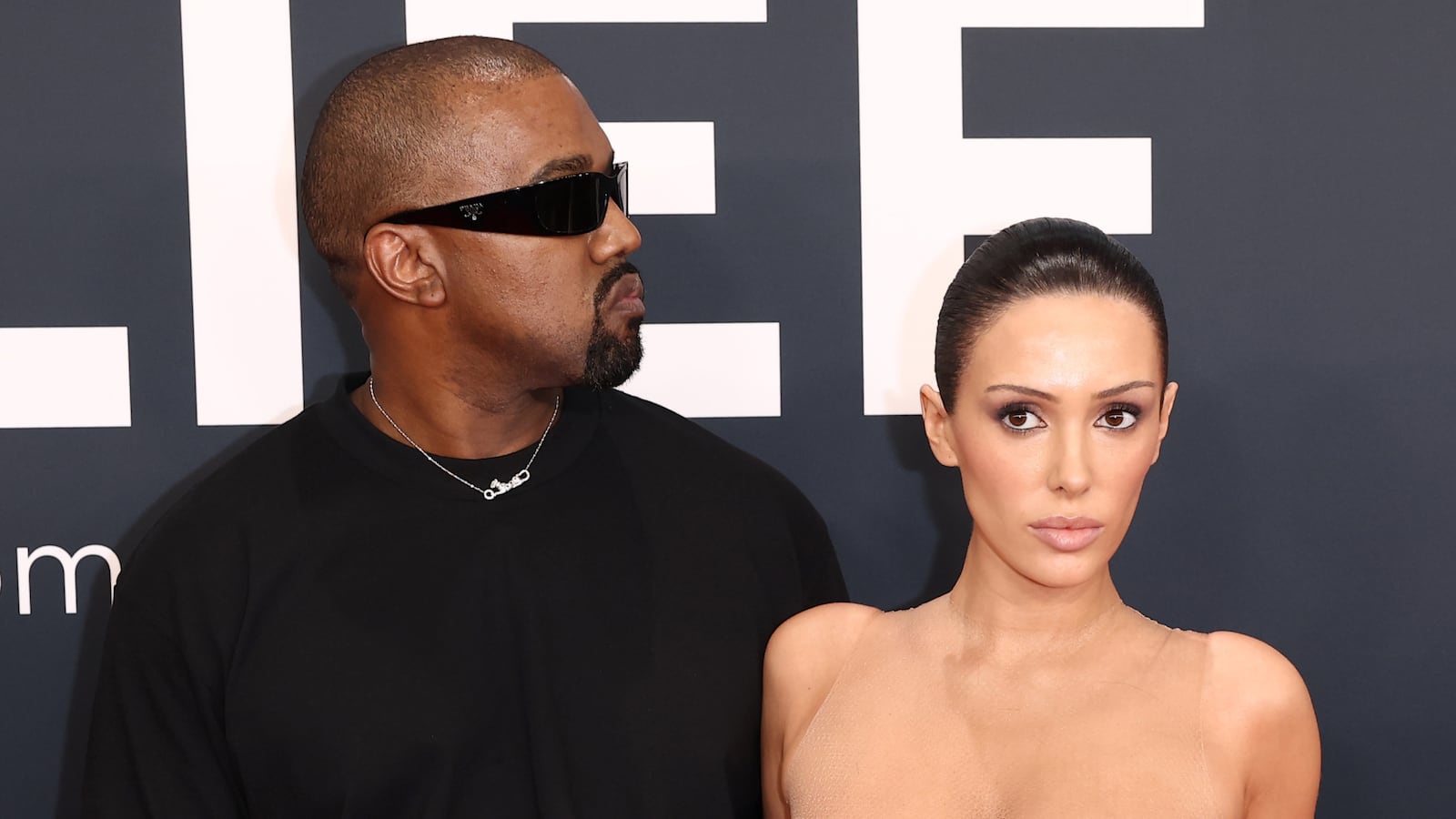 LOS ANGELES, CALIFORNIA - FEBRUARY 02: (EDITOR'S NOTE: Image contains nudity.) L-R, Kanye West and Bianca Censori attend the 67th Annual GRAMMY Awards on February 02, 2025 in Los Angeles, California. (Photo by Matt Winkelmeyer/Getty Images for The Recording Academy)