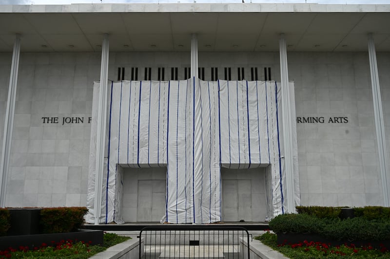 A tarp covers the facade of the John F. Kennedy Memorial Center for the Performing Arts in Washington, DC, on June 14, 2026.