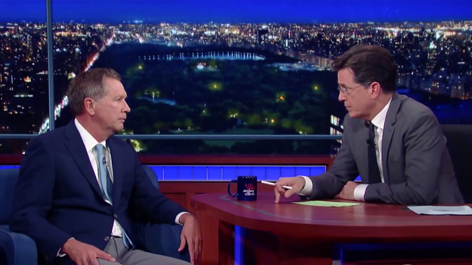 articles/2015/11/07/john-kasich-callously-laughs-off-colbert-s-pro-pot-point/151107-wilstein-colbert-kasich-tease_tx2e04