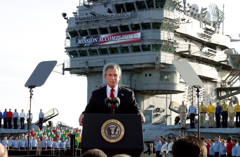 President Bush declares the end of major combat in Iraq as he speaks aboard the aircraft carrier USS Abraham Lincoln off the California coast, Thursday, May 1, 2003. The carrier will arrive in San Diego May 2, 2003, following a record 10-month deployment including "Operation Iraq Freedom." (AP Photo/J. Scott Applewhite)