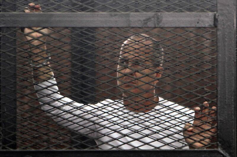 articles/2014/03/24/al-jazeera-journalists-are-on-trial-in-egypt-for-doing-their-jobs/140324-rosenfeld-egypt-tease_sk4pkj