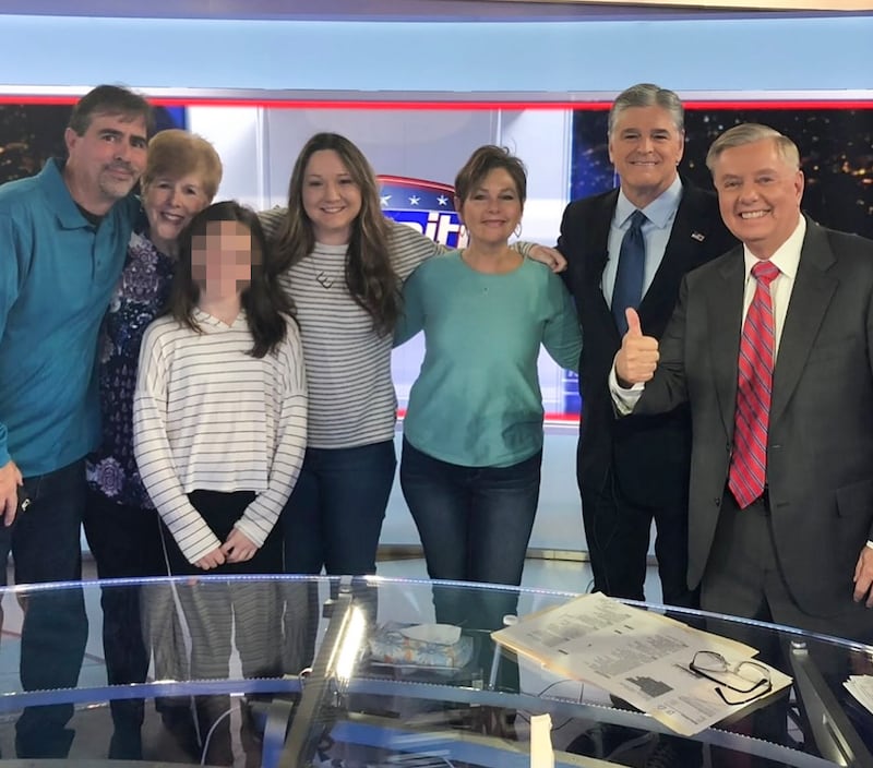 Darline Graham Nordone, husband Larry Nordone (left), his mother (second left), daughter Emillie (fourth from right), and her 17-year-old daughter with Larry, visit Sean Hannity with "Uncle Lindsey."