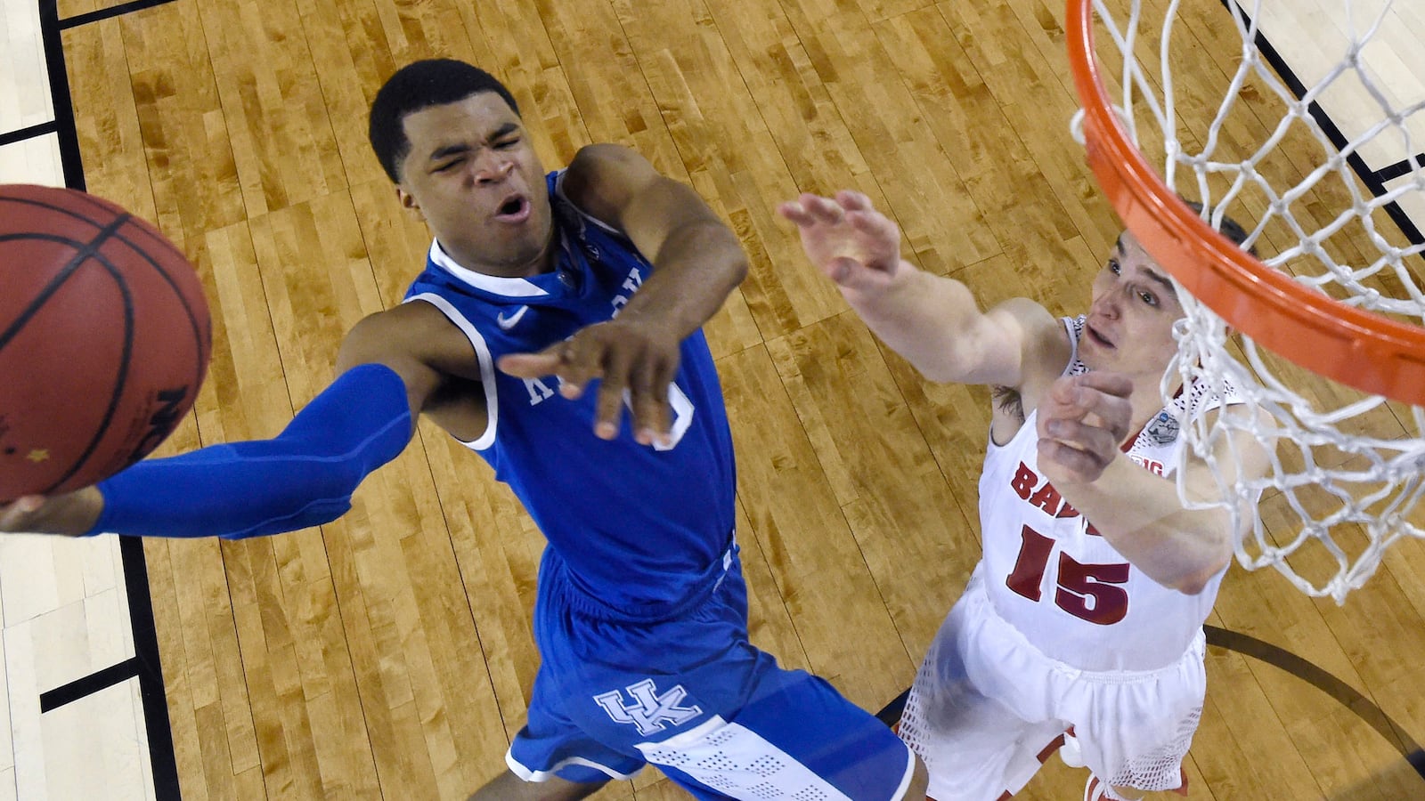 articles/2014/04/07/was-andrew-harrison-s-game-winning-three-pointer-clutch/140406-silverman-clutch-tease_m25fxy