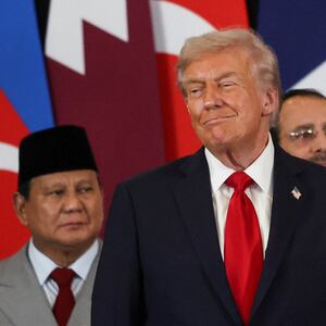 US President Donald Trump greets Indonesia's President Prabowo Subianto during a summit on Gaza in Sharm el-Sheikh on October 13, 2025. Trump landed in Egypt on October 13 for a summit on Gaza, following a lightning visit to Israel after a ceasefire he brokered entered into force.