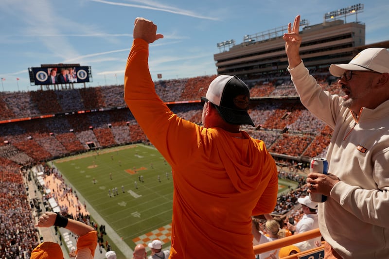 Tennessee fans react to Trump on the Jumbotron.