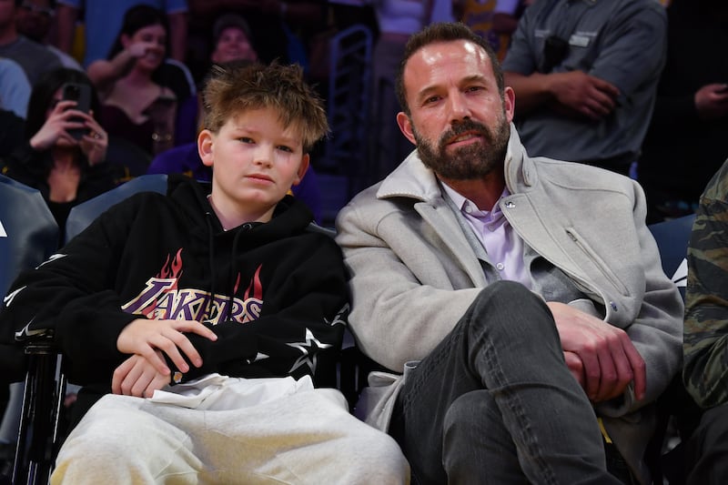 Ben Affleck (R) and Samuel Garner Affleck attend a basketball game between the Los Angeles Lakers and the Minnesota Timberwolves at Crypto.com Arena on February 27, 2025 in Los Angeles, California.